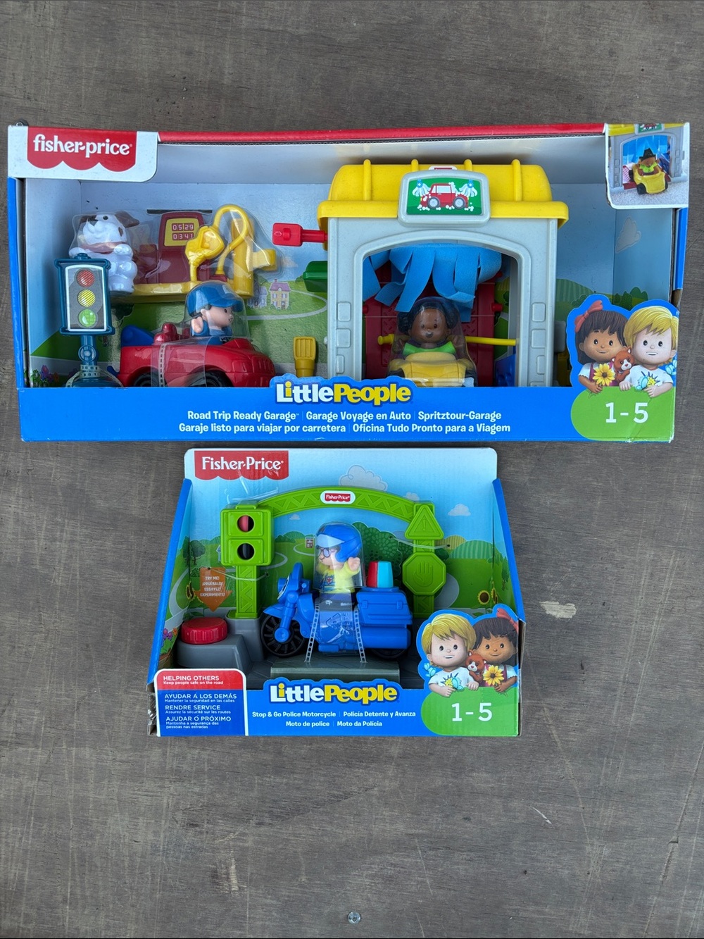 Fisher Price Road Trip Ready Garage and Stop and Go police motorcycle.